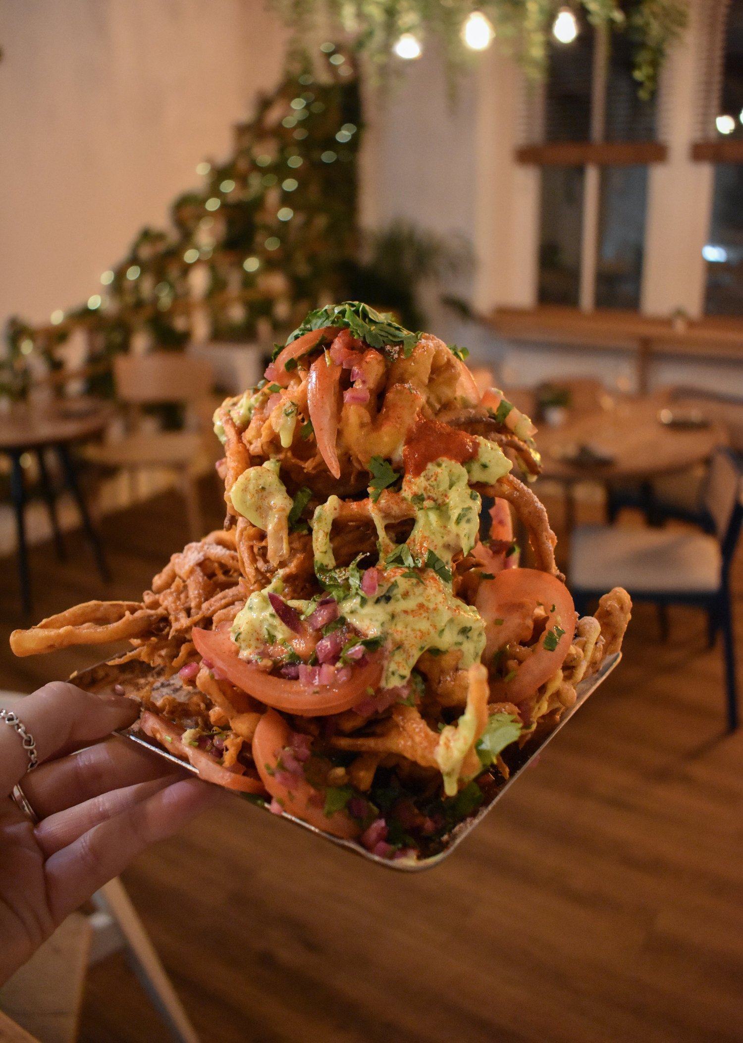Barua's loaded onion bhaji with chutneys and fresh salad